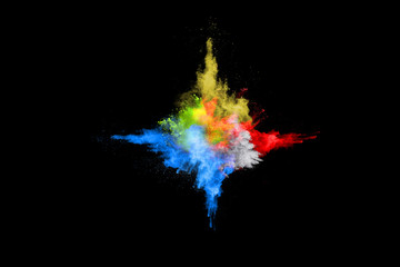 abstract colored dust explosion on a black background.abstract powder splatted background,