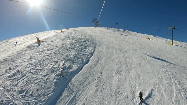 Cableway Ski Lifts ride by skier, snowboarder, pov