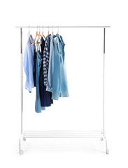 Rack with stylish clothes on white background