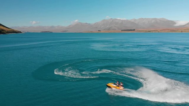 Jet Ski on Beautiful Turquoise Blue Water - Lake Tekapo, New Zealand - Aerial