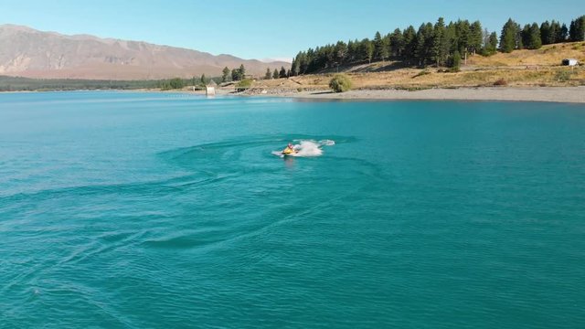 Jet Ski on Beautiful Turquoise Blue Water - Lake Tekapo, New Zealand - Aerial