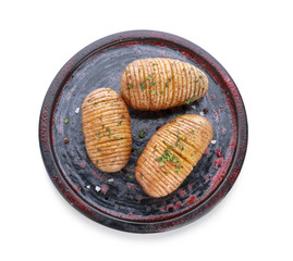 Plate with tasty baked potato on white background