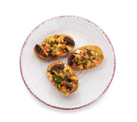 Plate with tasty baked potato on white background