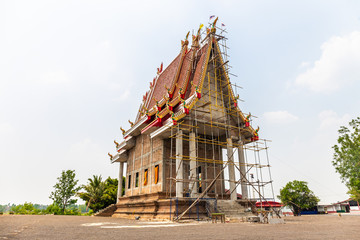 Fototapeta na wymiar Temple is under construction in countryside at thailand