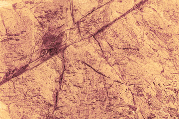 Vintage yellow background. Rough painted wall of aspen gold color. Imperfect plane of golden colored. Uneven old decorative toned backdrop of yellow tint. Texture of gold hue. Ornamental stony surface