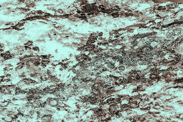 Vintage cyan background. Rough painted wall of hazel color. Imperfect plane of brown colored. Uneven old decorative toned backdrop of blue tint. Texture of azure hue. Ornamental stony surface.