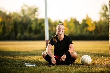 Female soccer player resting