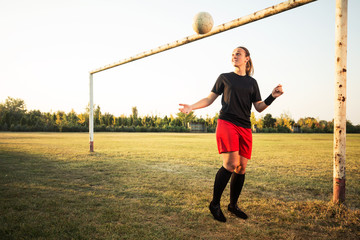 Young woman playing soccer