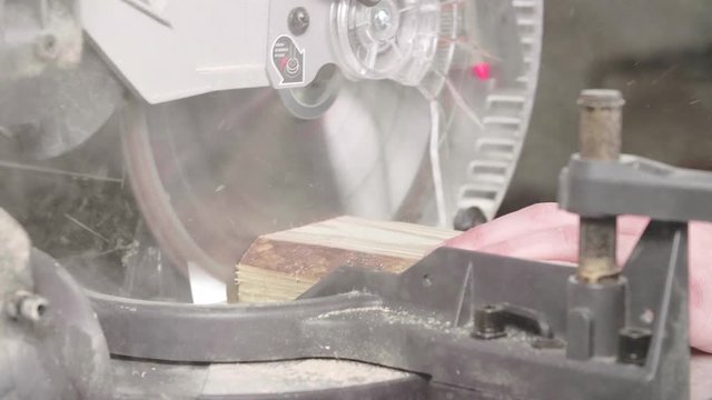 Sliding Miter Saw Cutting Lumber SLIDE RIGHT