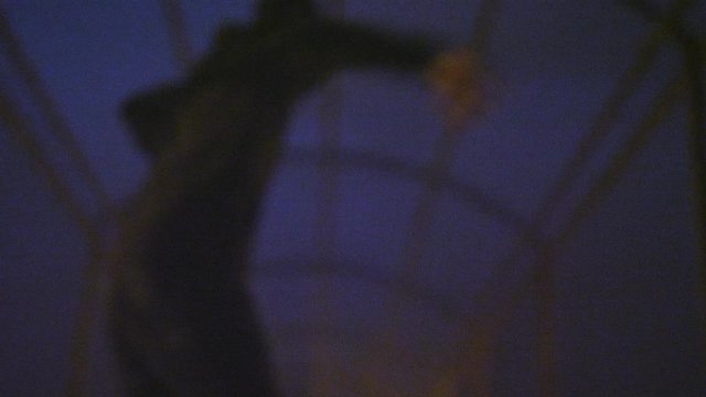 African American man running away in fear
