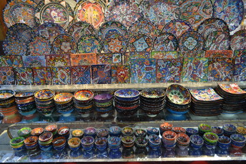 plates, bowls and crockery in the Spice Souq in Dubai, colorful retail display, shop setting