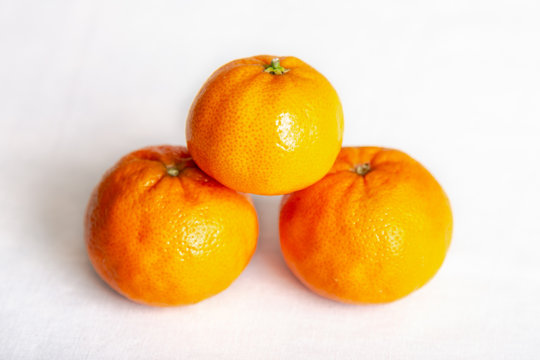 Three Mandarins white background
