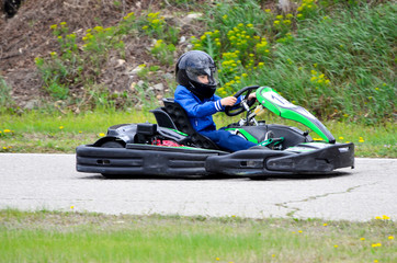 Driving go-cart on a sports track