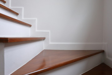 brown wooden hardwood stair in modern residential house