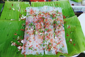 Chinese Steamed Rice Noodle Rolls on banana leaf
