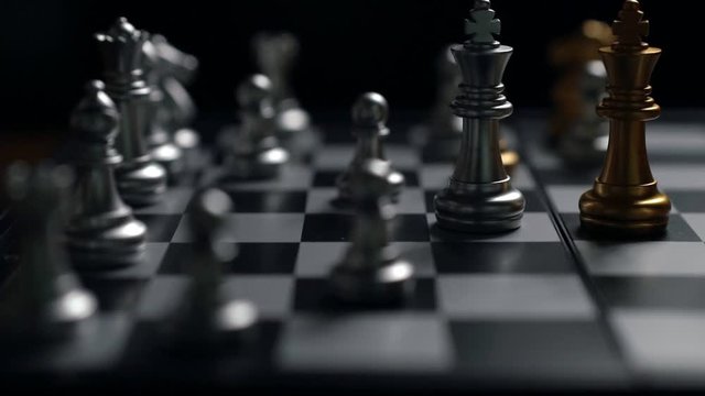 Close up man moving silver king chess defeat enemy on chessboard winner and victory concept,strategy planning business Slowmotion