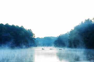 Fog on lake in winter.