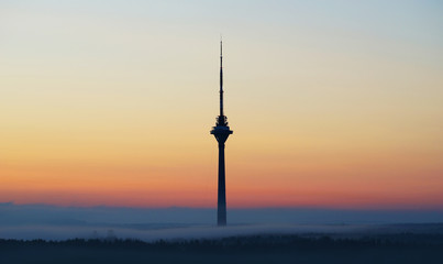 Tallinn tv tower in a light of sunset