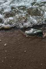 Rocks on Sandy Beach