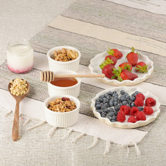 Series about granola, berry and greek yogurt suitable for a healthy breakfast, snack or dessert.
