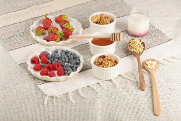 Series about granola, berry and greek yogurt suitable for a healthy breakfast, snack or dessert.