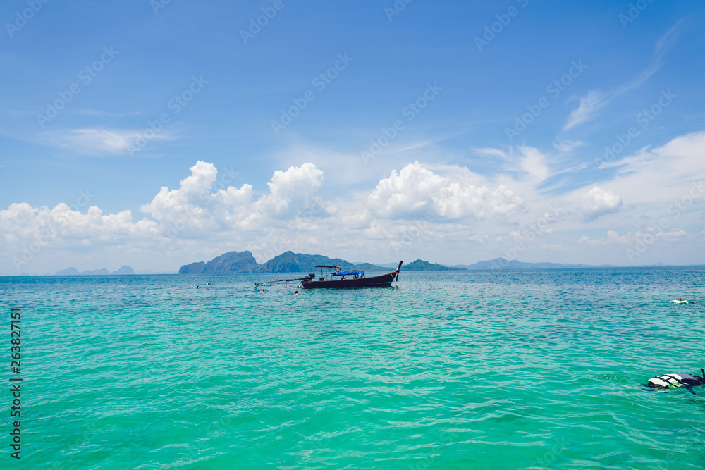 Wall mural travel to the sea and island by long tail boat of thailand