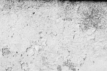 Old painted wall background texture close up. Black and white