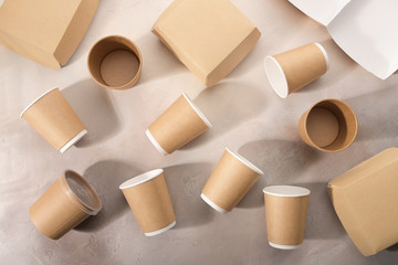 Biodegradable tableware on light background. Environmental protection. Secondary processing. The concept of zero waste.