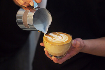 barista make coffee latte art