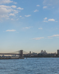 Brooklyn and Manhattan bridge over East River  with skyline of Brooklyn, viewed from Manhattan, New York, USA