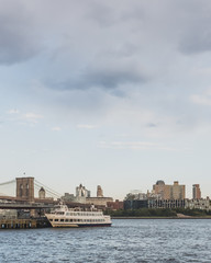 Brooklyn and bridge over East River with skyline of Brooklyn, viewed from lower Manhattan, New York, USA