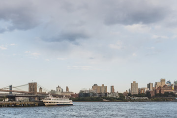 Brooklyn and bridge over East River with skyline of Brooklyn, viewed from lower Manhattan, New York, USA
