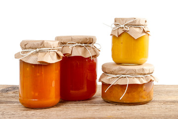 Colorful jams in glass jars