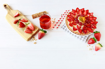 Strawberry smoothie, homemade tart and fresh fruits.