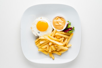 cutlet with egg and french fries