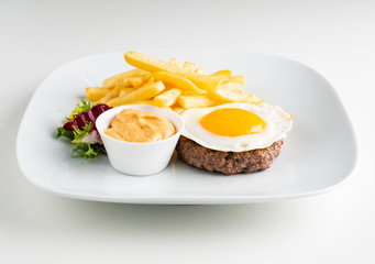 cutlet with egg and french fries