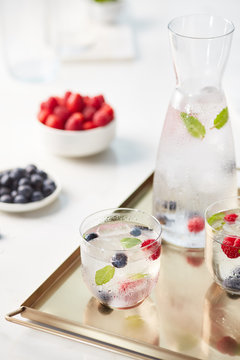 Detox water with fresh fruit in glasses.