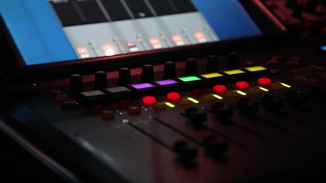 remote recordists closeup. Hand adjusts sound effects. Electric machine on table for working of sound designer or club dj at party in nightclub. Occupation for modern lifestyle, objects for listen at 