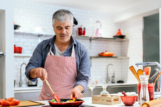 Adult Handsome Man Cooking