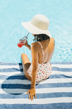 Brunette girl in a swimsuit