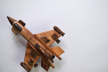 Close up Vintage wooden airplane toy made from bamboo. Isolated on white background.