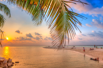 Obraz na płótnie Canvas Sunset on the beach of a Maldives island