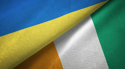 Ukraine and Cote d'Ivoire Ivory coast two flags textile fabric texture