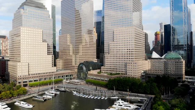 Aerial view of boats docked at the North Cove Marina (Hudson River) at Battery Park in Manhattan with Brookfield Place Complex and offices buildings on the background. New York, USA.
