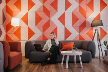 Young business woman in co working environment