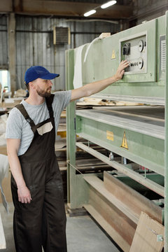 Carpenter Using Wood Processing Machine