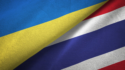 Ukraine and Thailand two flags textile cloth, fabric texture