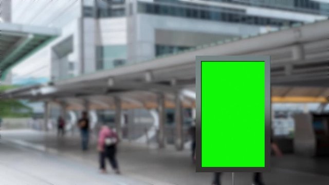 Green screen blank billboard outdoor advertising and Time Lapse of People walking busy modern in city Bangkok Thailand.
