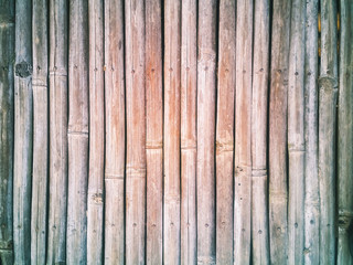 Background of old wooden wall, Old bamboo fence background, abstract wooden for texture.