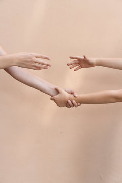A pair of hand symbolising kindness, caring and help